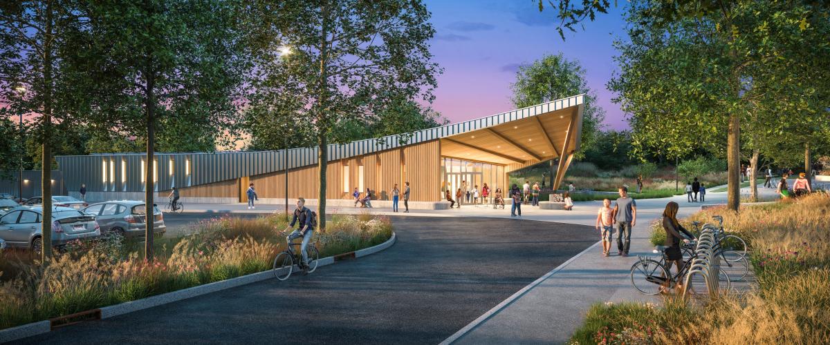 Exterior rendering of the Danehy Gateway Pavilion building at twilight with people on bicycles, in wheelchairs, walking and sitting around the building exterior.