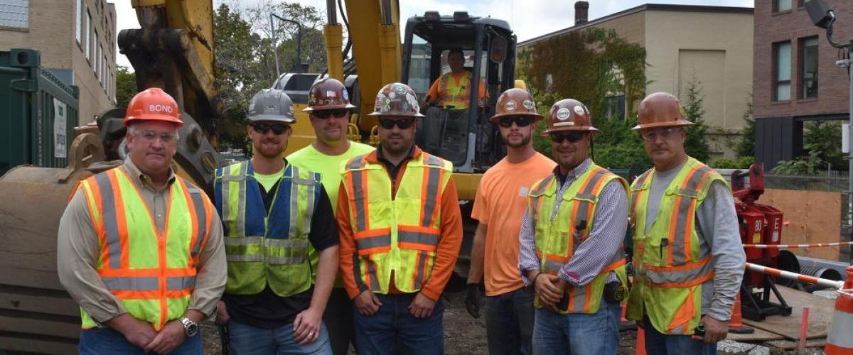 Bond Brothers employees standing together