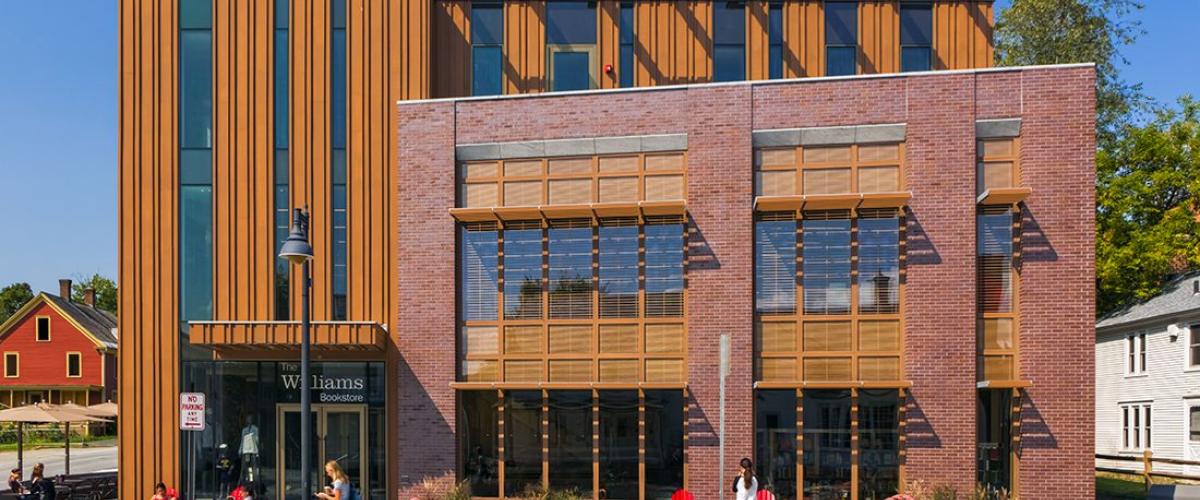 Photograph of the exterior entry of the Williams Bookstore showing brick and wood facade